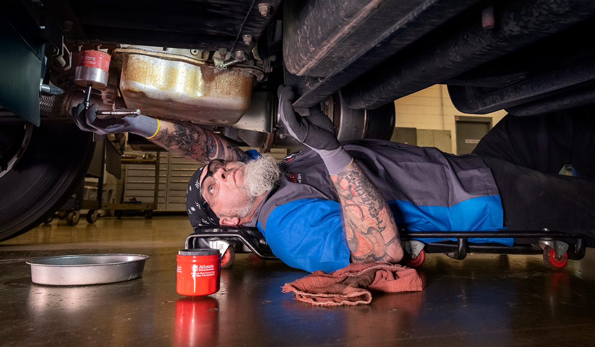 Photo of service technician changing filter